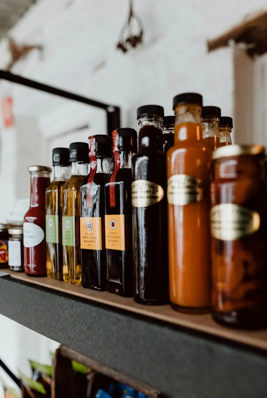 Bottles of local spirits lined up on the bar shelf