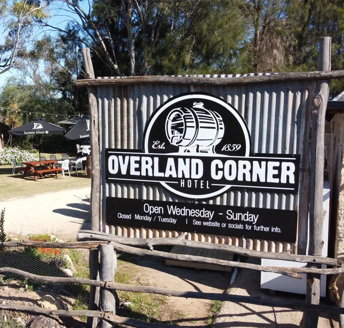 The roadside sign at the turn-off